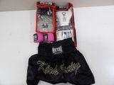a pair of black boxing shorts with gold writing on them
