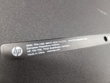 a close up of a label on the back of a laptop