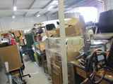 a room filled with lots of boxes and other things