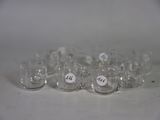 a lot of empty glasses sitting on a table
