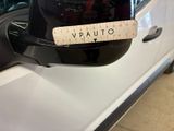 a sticker on the side view mirror of a car