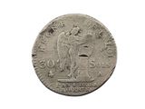 une vieille pièce de monnaie sur laquelle figure l'image d'un ours