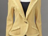 une veste jaune pour femme avec des franges, posée sur un mannequin, mannequin, mannequin, mannequin, mann