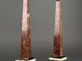 pair of marble obelisks with black and white marble bases