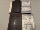 a lot of stamps in a binder on the table