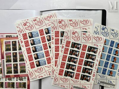 a lot of stamps that are sitting on top of a table