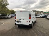 a white van that is parked in a parking lot