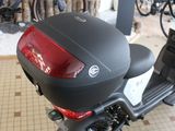 a scooter that is parked in a room