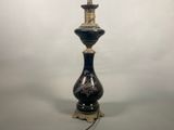 a lamp that is sitting on a table in the room