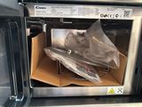 a microwave that has a box inside of it