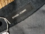 a close up of a person ' s jacket with a label on it