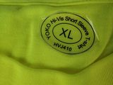 yellow t - shirt with a smiley face on the front