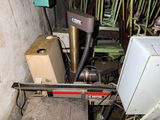 a machine that is sitting in a room with a lot of wires