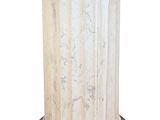 a statue of a man sitting on a pedestal