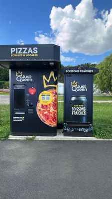 two vending machines on the side of the road
