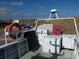a white truck with a life preserver on the back of it