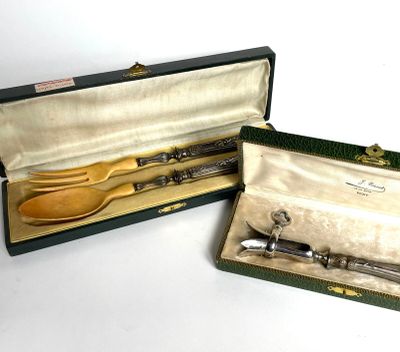 two wooden spoons and a wooden spoon in a case