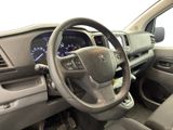 the interior of a car with a steering wheel and dashboard