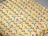 a chair that has a floral pattern on it