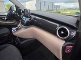 the interior of a car with a steering wheel and dashboard controls