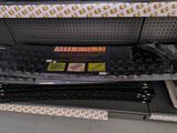 a shelf that has a bunch of items on it