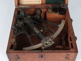 an old wooden box with a sexet inside of it