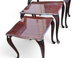 three tables with glass tops and legs on a white background