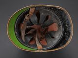 a close up of a helmet on a table
