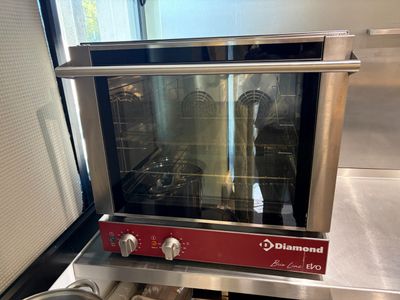 an image of a commercial oven in a commercial kitchen