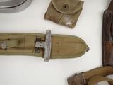 a pair of shoes and a belt on a table
