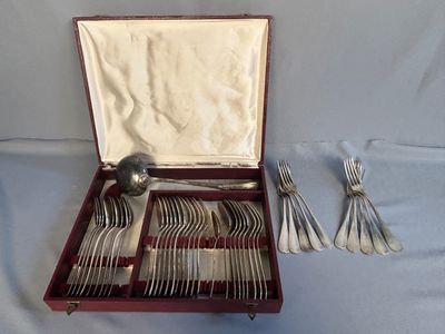 silverware in a wooden box with silverware in it