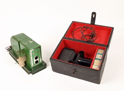 a small box with a camera and a small box with a camera inside of it