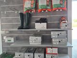 a shelf with a lot of items on it in a store