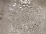 a close up of a piece of cloth with a design on it