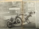 an old photo of a man riding a motorcycle with a woman on the back