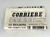 newspaper on a white table with a black and white image of a newspaper