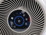 an image of a white fan with a blue light on it
