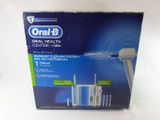 an image of a box of toothbrushes sitting on a white surface