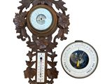 a clock and a thermometer on a white background