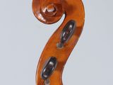 an old violin with a wooden back and a long neck