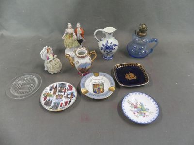 a lot of small plates and cups on the table