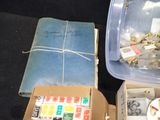 a box of assorted items sitting on the floor