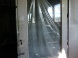 a white door that has a sheet covering it