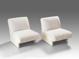 paire de chaises longues avec coussins rembourrés blancs