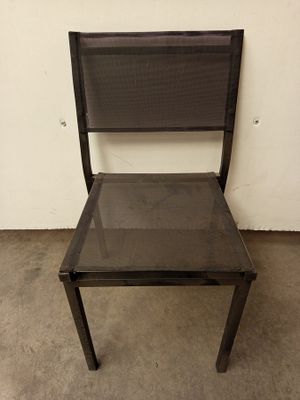 Lot de 4 chaises de jardin de couleur noir (vendu en l'état)
