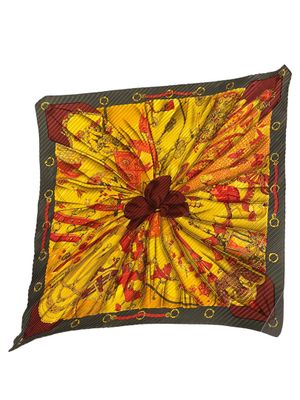 an image of a yellow and red square with a bow on it