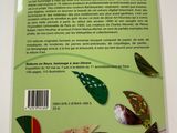 the back cover of a book with a picture of a bird and a leaf on it