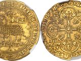 two gold coins, one of which is a sheep and the other of which is a cross