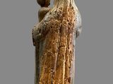 an image of a statue of a woman holding a baby