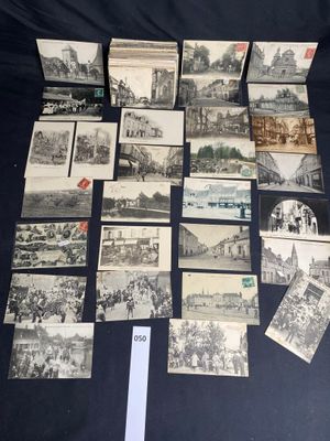several old black and white photographs of buildings and buildings on a table